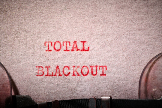 total blackout message concept written with a typewriter