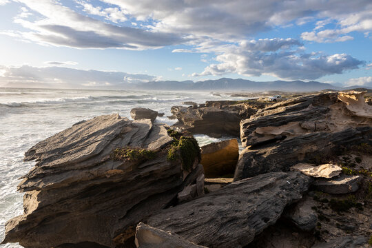 Dramatic rocky coastline of Walker Bay Nature Reserve, Stanford, South Africa