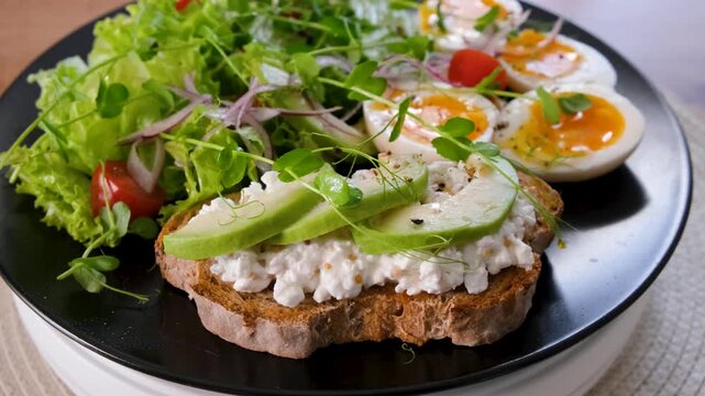 Spinning Healthy Meal with Avocado Toast and Fresh Salad Close Up