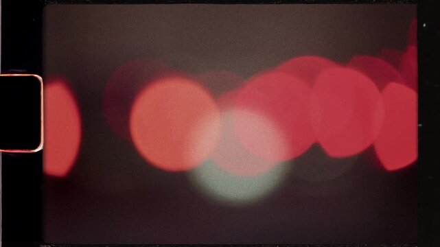 Authentic super 8mm film scan with blurred bokeh lights