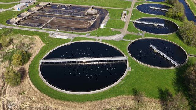 Aerial view of wastewater treatment plant and clarification tanks