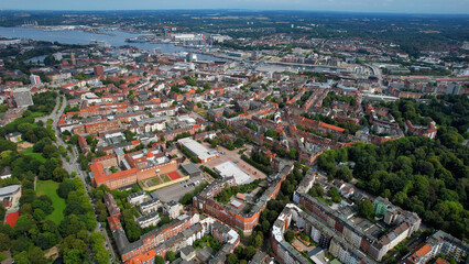 Fototapeta premium Aerial view around the old town of the city Kiel in Germany on a sunny spring noon