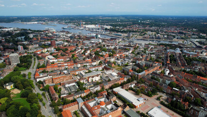 Obraz premium Aerial view around the old town of the city Kiel in Germany on a sunny spring noon
