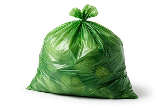Green plastic garbage bag on plain white background