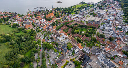 Aerial view around the old town of the city Schleswig, 24837 in north Germany on a sunny spring noon © Luca