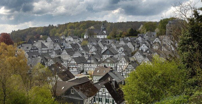 The historic centre with half timbered houses of Friedensdorf Germany, a village in the municipality of Saerbeck, district Steinfurt, the state of North Rhine-Westphalia. View on the town