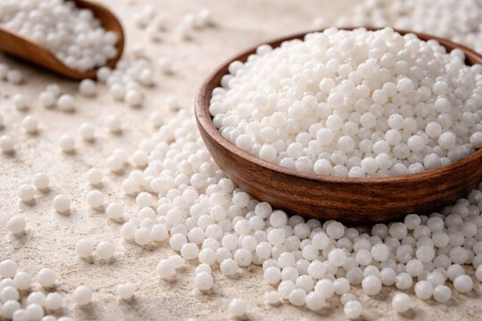 Fresh uncooked Sabudana displayed with detailed texture and plenty of room for text placement
