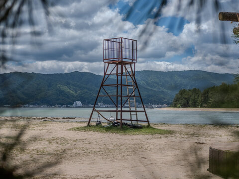 A close view of a lifeguard chair on a beach in Japan