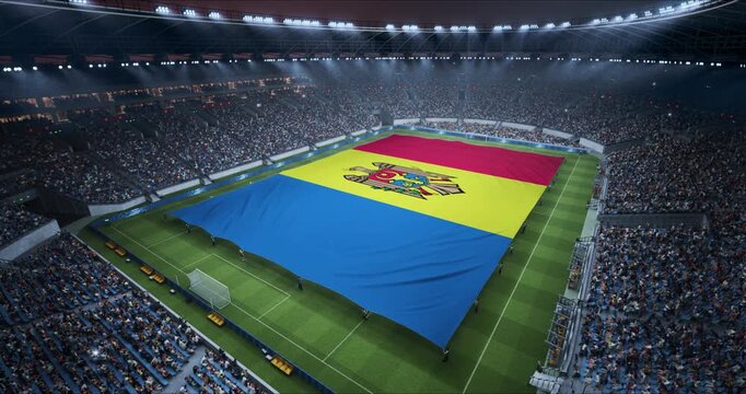 Professional Stadium Soccer Game Championship With Flag of Moldova Spread Across the Pitch Before Football Match Start. Cheering Crowds of Fans Surround the Field. Aerial Elevated Static Wide Shot