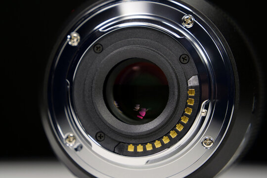 Micro Four Thirds MFT macro lens mount showing mount details on black backdrop