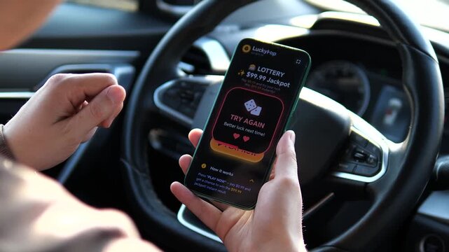 A person playing a mobile lottery jackpot game inside a car. Screen displays a Try Again result. Perfect for content about gambling addiction, betting apps, mobile gaming risks, and modern digital