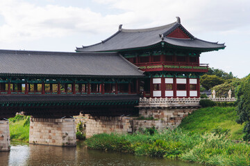 Naklejka premium Woljeonggyo Bridge, Gyeongju, South Korea, in a autumn fall day with a blue sky, covered bridge, Silla Dynasty Pavilion, North Gyeongsang Province, Silla dinasty traditional Korean architecture