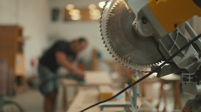 Circular miter saw blade in a carpentry workshop