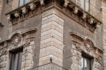 Obraz premium Historic Baroque Architecture and Weathered Stone Wall in Catania, Sicily, Italy
