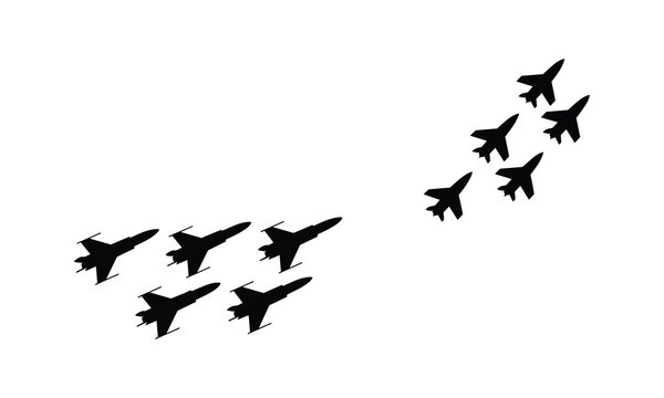 Silhouette of fighter jets flying in formation