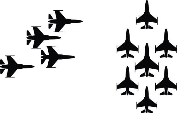 Silhouette of multiple fighter jets flying in formation