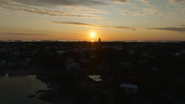 Aerial view rising over the cityscape of Hanko, summer sunset in Finland