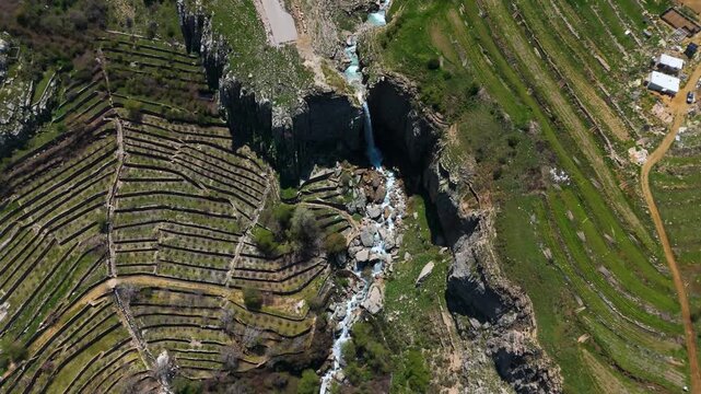Drone aerial shot of a waterfall in Faraya Lebanon with beautiful natural surroundings