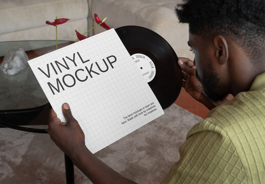 Mockup Of Man Holding Customizable Lp Cover