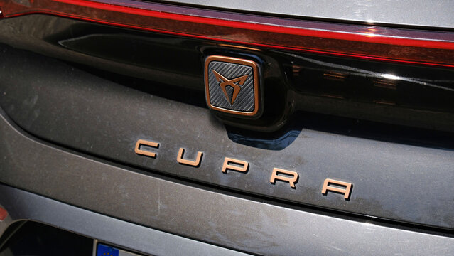 Close-up of Cupra car emblem. Palermo, Sicily - June 29, 2025. CUPRA is Spanish car brand focused on sports, high-performance and design cars with elements of electrification.