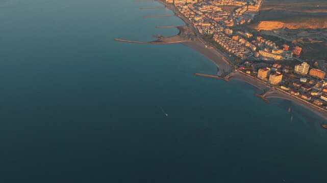 Aerial view of santa pola coastline at sunrise