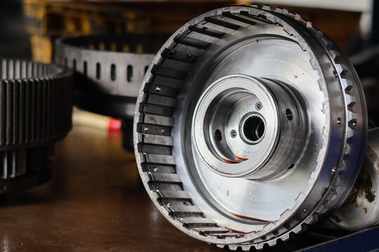 A close-up view of a metallic clutch hub and drum assembly for an Allison automatic transmission, showing the internal splines and precision-engineered steel components.