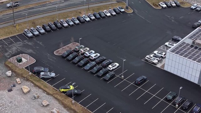 Aerial View Cars Parking Lot Halifax Nova Scotia Canada Auto Dealership With New Vehicles Parked In Rows Automotive Retail Transportation Industry Business Modern Exterior Scene April 3, 2026.