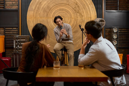 Young professionals let loose and enjoy a night of singing and laughter