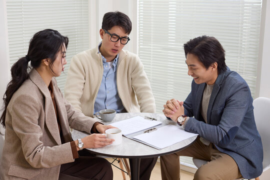 Colleagues in discussion at the coffee table