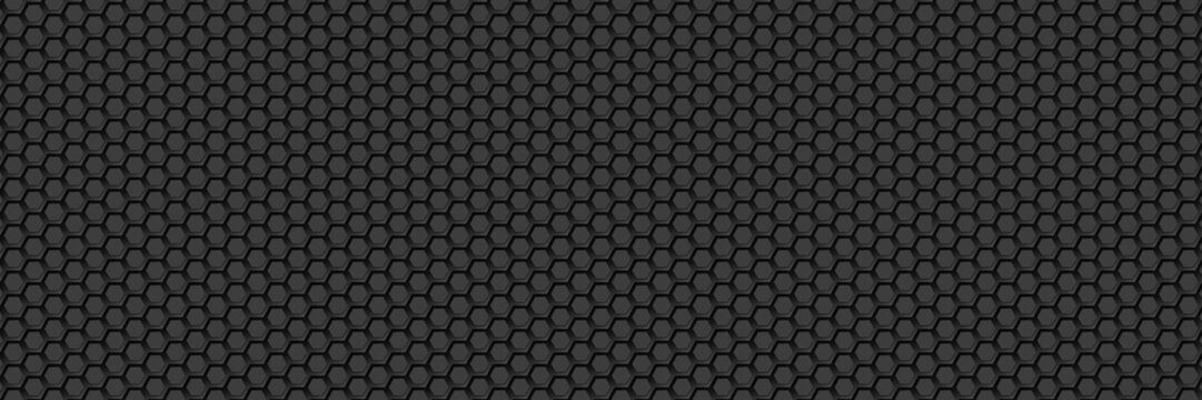 Black circular dot honeycomb micro pattern textured surface.