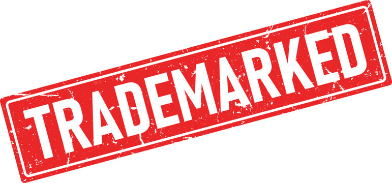 Grunge red rubber stamp impression with the word Trademarked at an angle