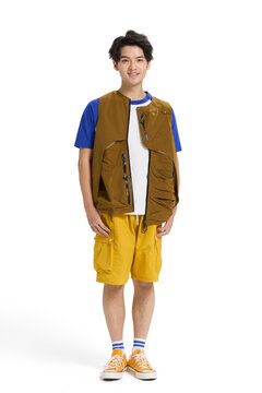 A portrait of a trendy young man dressed in vibrant colors