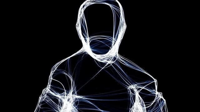 Slow tracking shot of glowing wireframe humanoid figure rotating and pulsing against black studio background