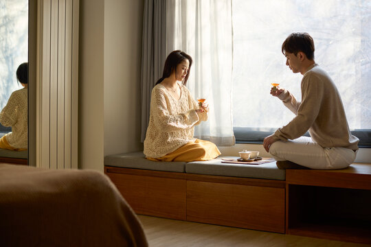 Young couple sharing a perfect moment over tea
