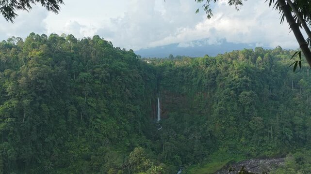 Scenic kapas biru waterfall in east java
