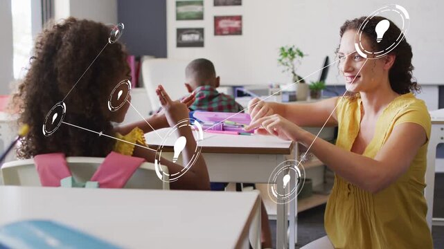 Teacher kneeling starting node overlay guiding girl's hands for counting in school, pink backpack