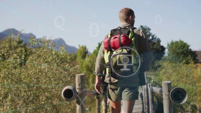 Male hiker with backpack walking bridge toward peaks camera pullback activating travel HUD icons