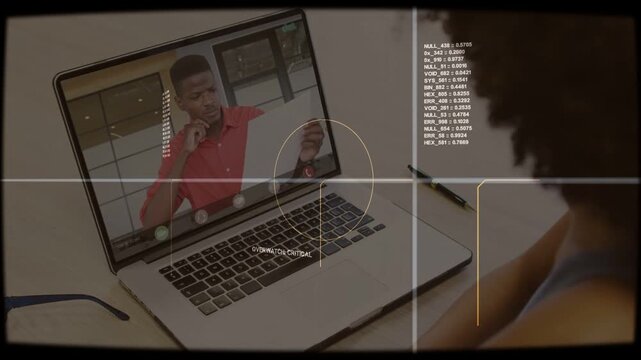 On-screen man raising object and demonstrating, woman watching, HUD centering OVERWATCH CRITICAL