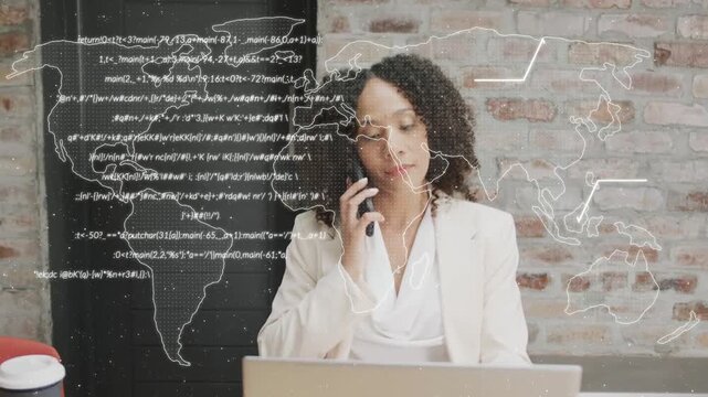 Woman at desk picking phone taking tech call while switching devices with world map or code overlayi