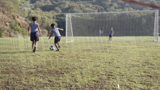 Child touching ball, boys dribbling and feinting toward goal, keeper moving, sports overlay showing