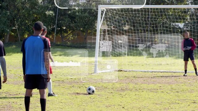 Blue bib watching, soccer pen taker placing, striking ball, HUD overlaying, keeper diving for goal