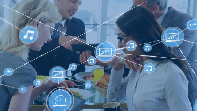 Woman tapping tablet man pointing team watching as blue icons growing linking over table for biz