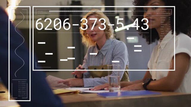 Woman leading office meeting, pointing at documents while HUD appearing, updating data for review