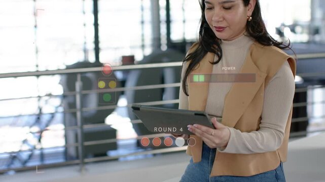 Woman holding tablet and tapping to adjust POWER bar for ROUND 4 technology demo