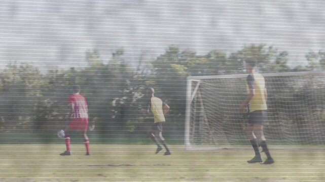 Sports male players contesting ball after cross into goal, overlay marking players, defending goal