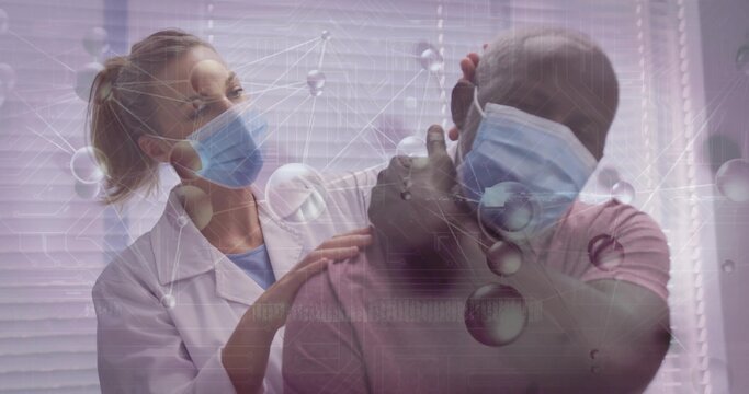Placing clinician's hand on masked man's shoulder while touching neck in clinic, lab coat, overlay