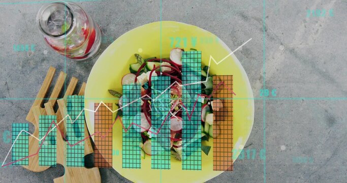 Showing yellow bowl with radish and greens on gray tabletop, paddle with utensils, jar and overlays