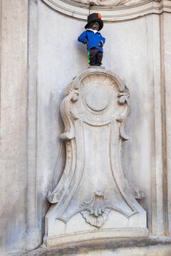 Manneken Pis or Little Pissing Man statue in Brussels city, Belgium