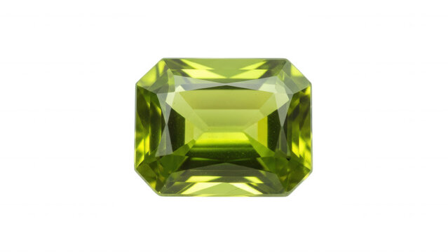 Emerald cut peridot gemstone with bright green hue and sharp facets isolated on a transparent background