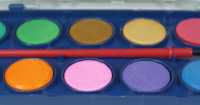 Watercolor paints in various colors for painting projects. Palette of colours. Creative watercolor set